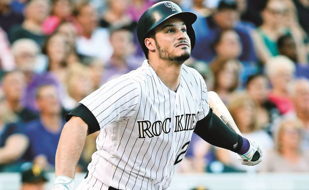 Nola Arenado no sólo fildea bien, en 2017 bateó para .300 (JACK DEMPSEY. AP)