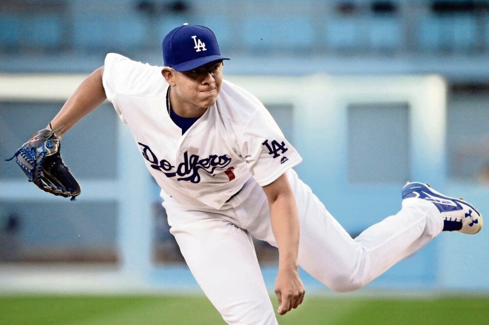 Urías ya no salió para el quinto inning; llevaba 77 pitcheadas (JAE C. HONG. AP)