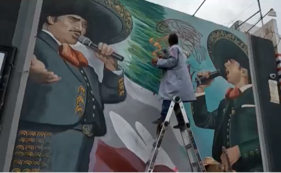 La obra muestra a don Vicente y a su hijo. Foto: Tomada del video