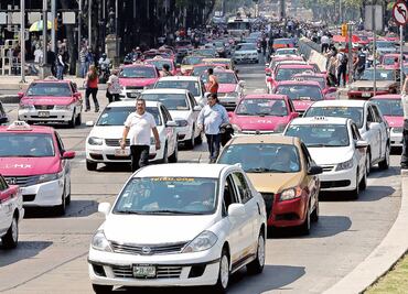 Taxistas amagan con bloqueos por uso de tabletas