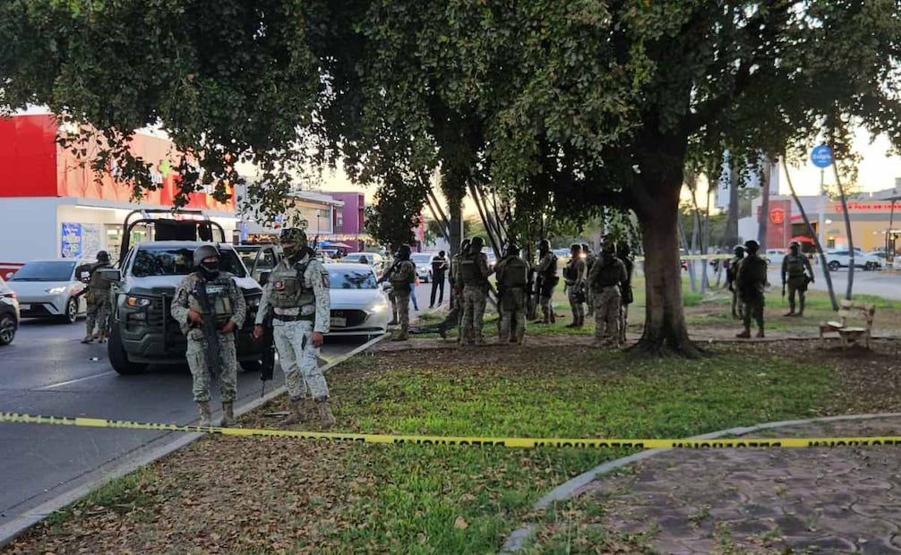 Los cuerpos de dos personas del sexo masculino atados de pies y manos con impactos de bala, en Culiacán, Sinaloa. Foto: Especial