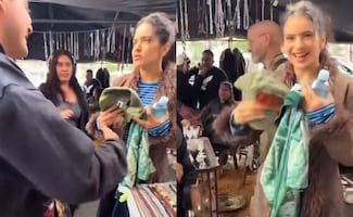 Rosalía se pasea por La Lagunilla; así fue captada junto a uno de sus fans