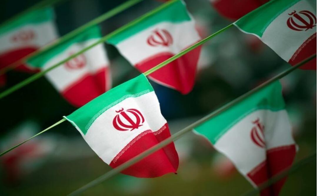 Iran's national flags are seen on a square in Tehran – Photo: Morteza Nikoubazl/REUTERS