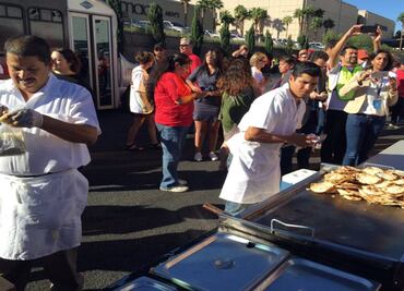 Taco trucks build a “wall” outside Trump's Las Vegas Hotel