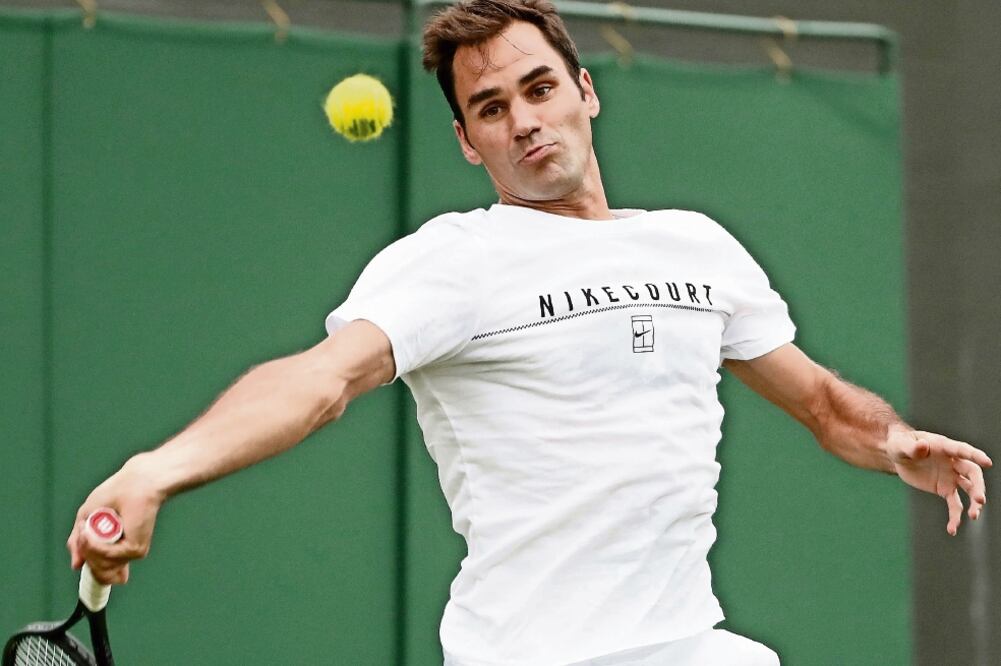Aunque Federer es quinto del ranking, será tercer cabeza de serie. FOTO: PETER KLAUNZER. EFE