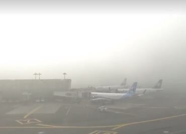 Continúa suspensión de operaciones del AICM por banco de niebla