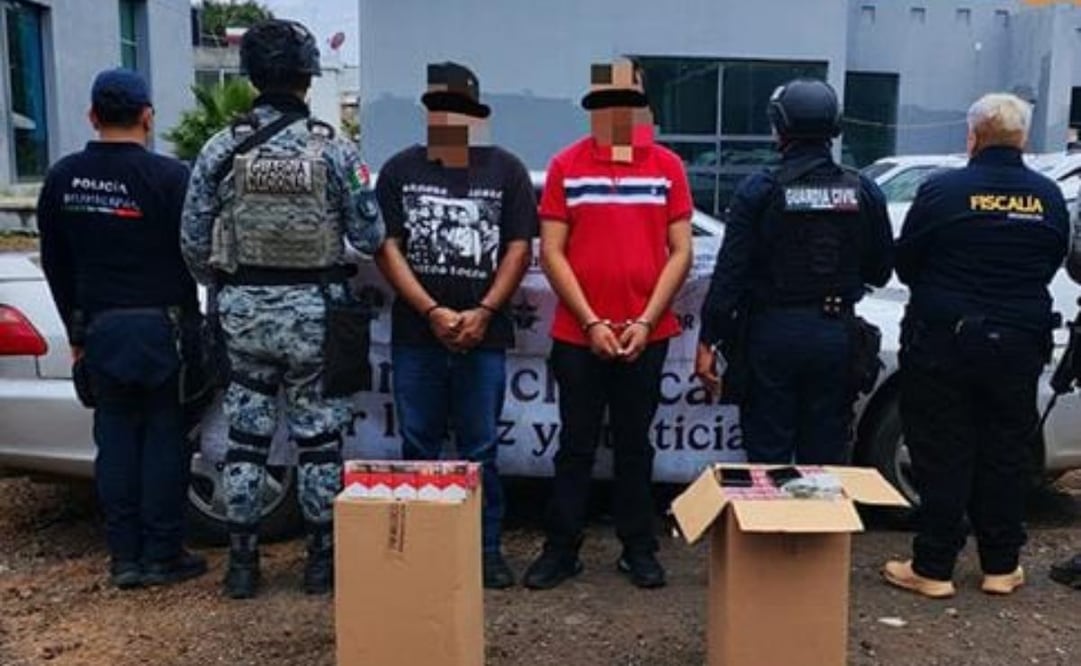 Autoridades de seguridad arrestaron a dos presuntos extorsionadores en Uruapan, Michoacán. Foto: Especial