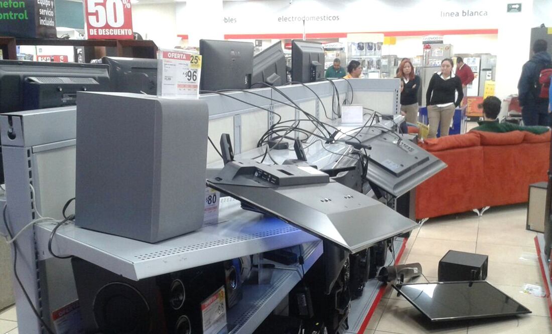 Comercio saqueado en Edomex. Fotografía de Xinhua