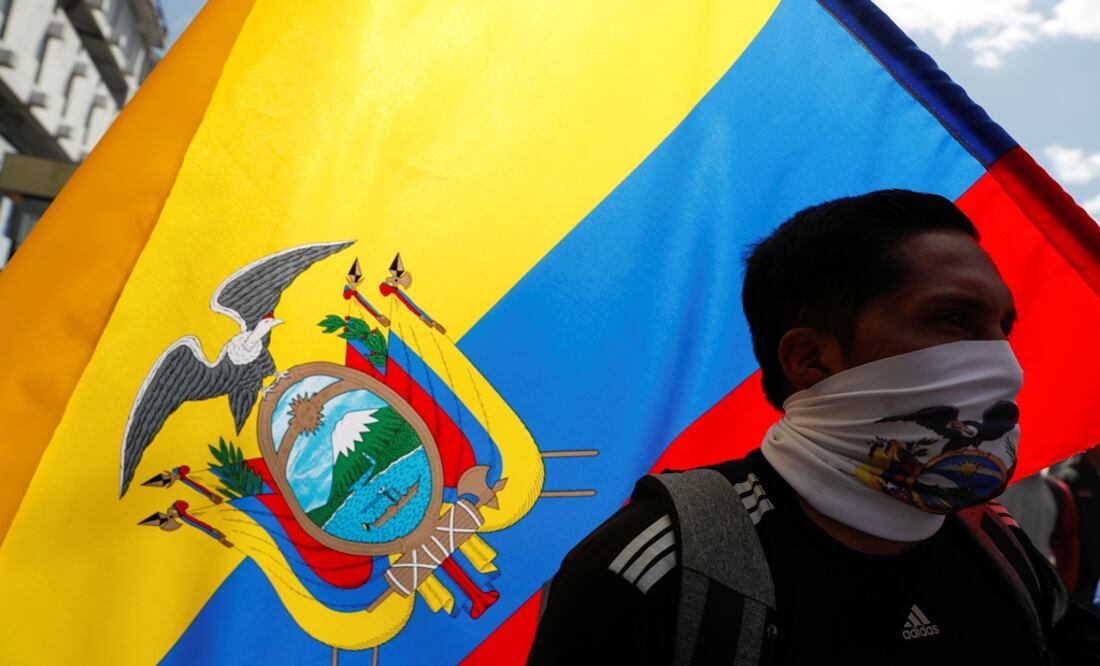 A demonstrator looks on in front of an Ecuadorian flag during a protest against Ecuador's President Lenin Moreno's austerity measures in Quito, Ecuador - Photo: Carlos Garcia Rawlins/REUTERS