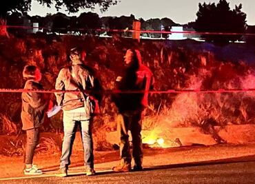 Hallan dos cuerpos calcinados en carretera de Tlaxcala; uno podría corresponder al de un niño