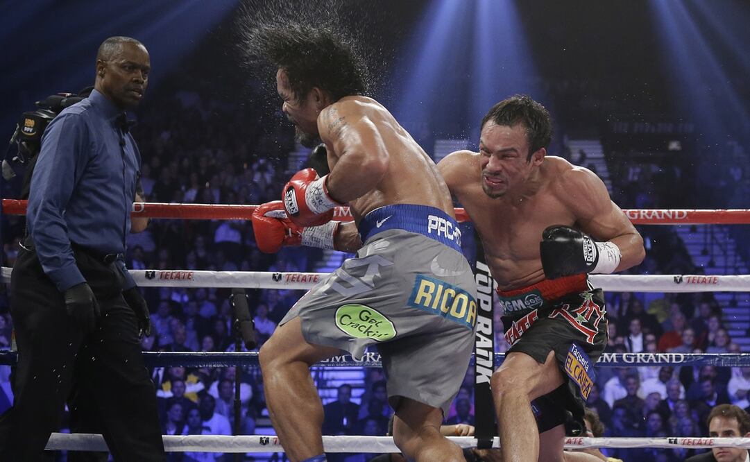 Juan Manuel Márquez propinando un brutal golpe a Manny Pacquiao - FOTO: AP