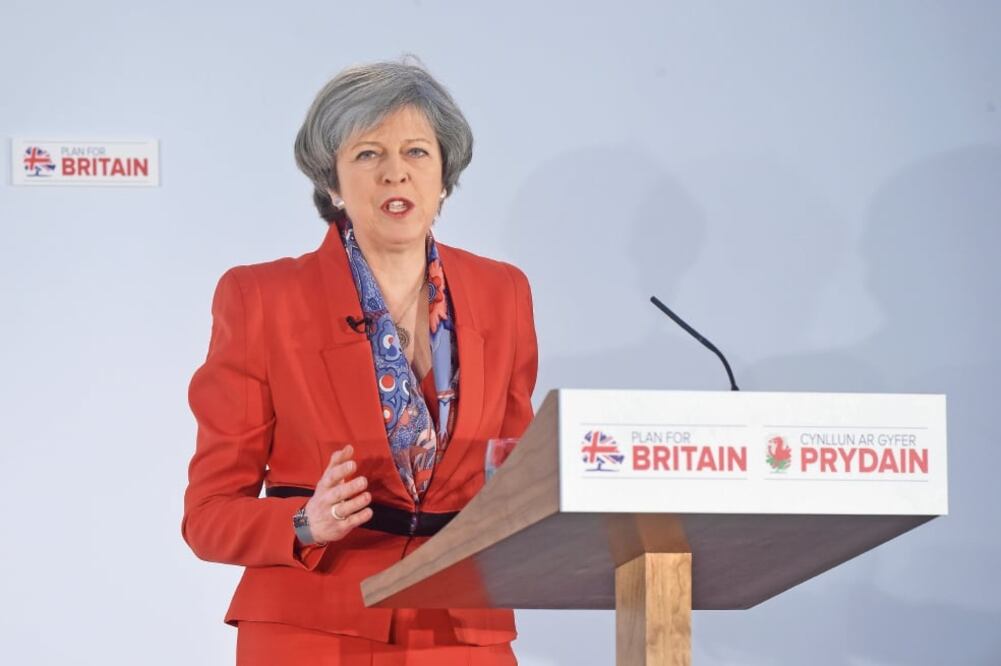 La primera ministra de Reino Unido, Theresa May, ofreció el viernes un discurso ante el Partido Conservador en Cardiff, Gales. (REBECCA NADEN. REUTERS)