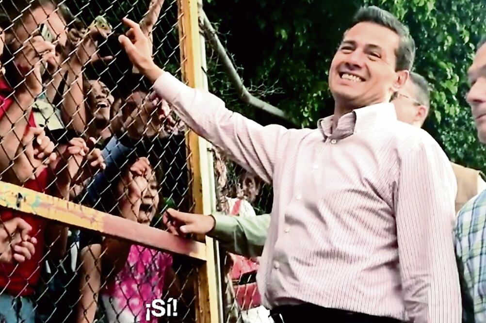 El presidente Peña Nieto pidió abrir una reja que lo separaba de ciudadanos que querían convivir con él. (ESPECIAL)