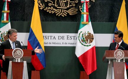 Combatir corrupción, dice Santos a Peña Nieto