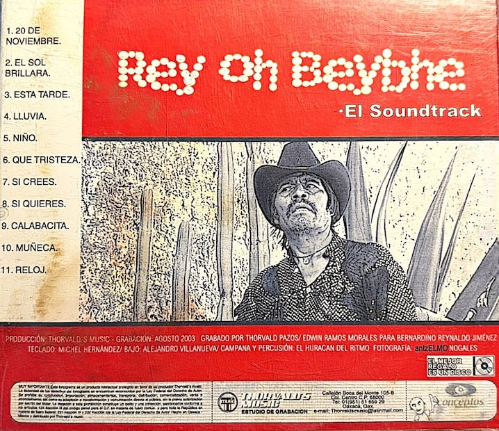 Rey Oh Beyve. El Soundtrack: una película de balazos, madrazos y canciones. Contraportada del vol. 7, 2003 Crédito: Thorvald Pazos