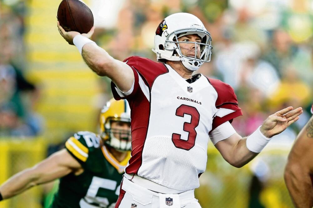 Carson Palmer se mantuvo sin lesiones esta campaña y posee el segundo mejor rating (106.7) de la NFL (TOM LYNN. AP)