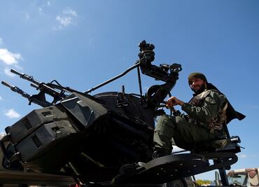 Libya crisis: Air strike at Tripoli airport as clashes rage