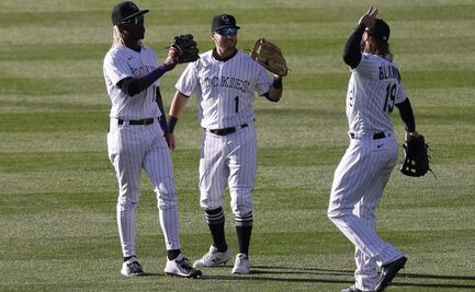 Rockies dejan a Dodgers con primera derrota en comienzo defensa título