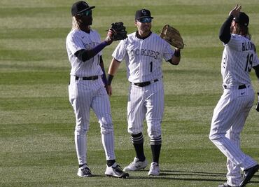 Rockies dejan a Dodgers con primera derrota en comienzo defensa título