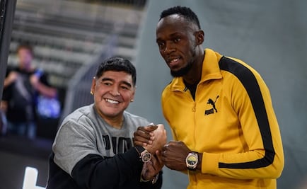 Usain Bolt recibe consejos futbolísticos de Maradona