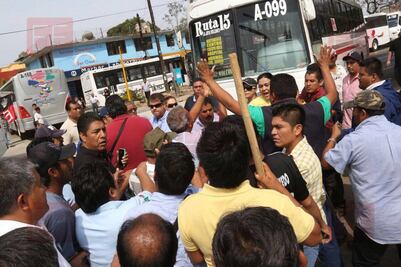 Transportistas y empresarios protagonizan gresca en Oaxaca