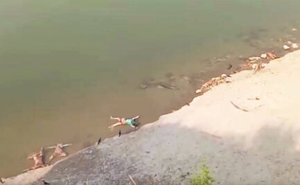 Impactan fotos de cuerpos flotando en el Ganges