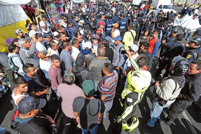 Chocan comerciantes y granaderos en Tepito