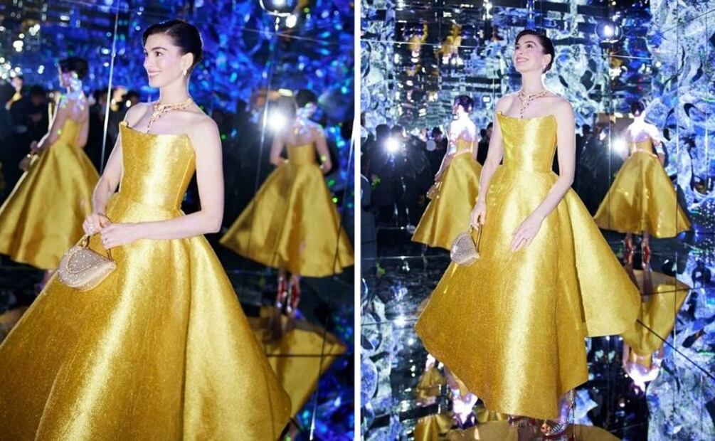 Anne Hathaway luce un vestido dorado de la colección primavera/verano 2025 de Oscar de la Renta. Foto: Instagram @oscardelarenta