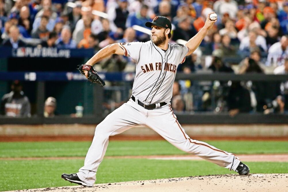 Madison Bumgarner tiró la ruta completa y otra vez dominó a los Mets (KATHY WILLENS. AP)