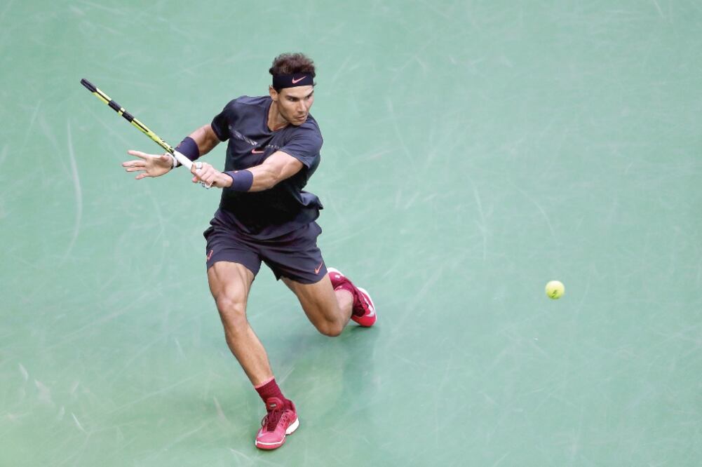 Rafa aprovechó la ausencia de tres de los mejores tenistas del mundo (AL BELLO. AFP)