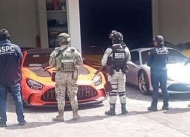 Fuerzas federales realizan cateo en casa de empresario asesinado en Mérida; aseguran automóviles de lujo