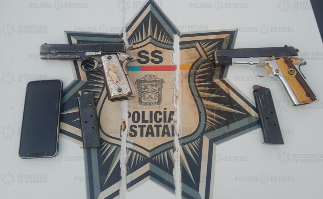 En el lugar se aseguraron tres armas de fuego dos cortas, tipo pistola, y una larga. Foto: cortesía Secretaría de Seguridad