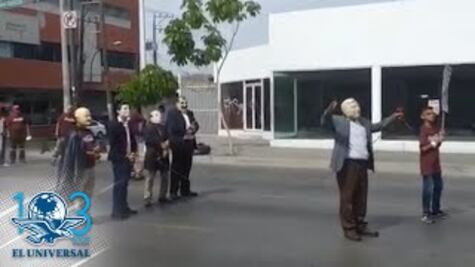 "Detienen" a exmandatarios en desfile del Día del Trabajo en Sinaloa