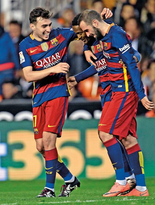El Haddadi y Alex Vidal celebran el gol del empate ante Valencia (ALBERTO SAIZ. AP)