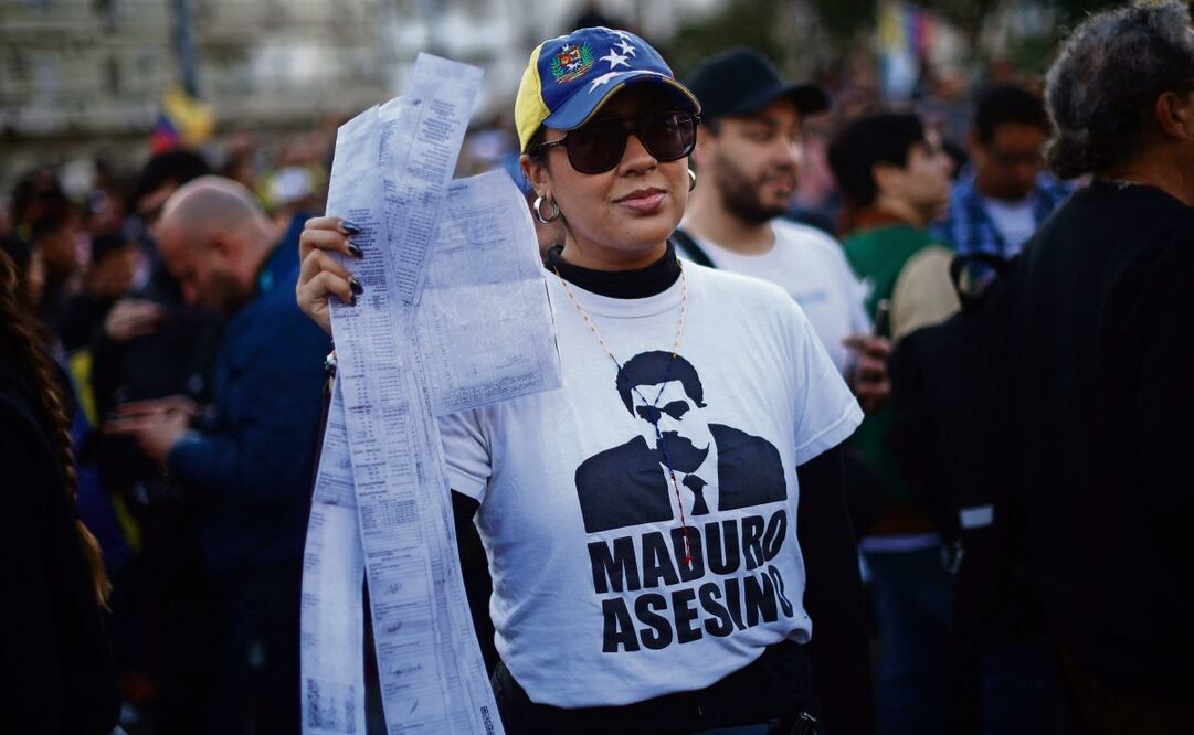 Manifestantes durante la protesta del domingo en Caracas. Foto: Tomás Cuesta AFP