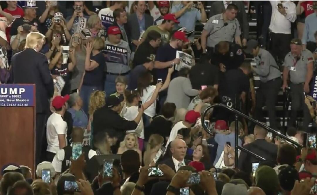 During the rally, the presumptive Republican presidential nominee was interrupted repeatedly by protesters, who shouted, held up banners and resisted removal by security officers. (Photo: AP) 