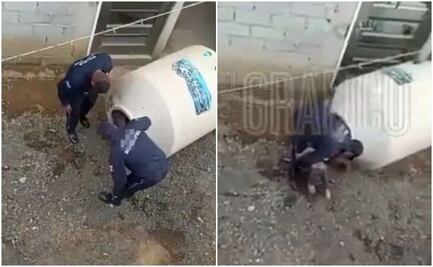 Video. Policías rescatan a niña de 5 años atrapada en tinaco en el Edomex