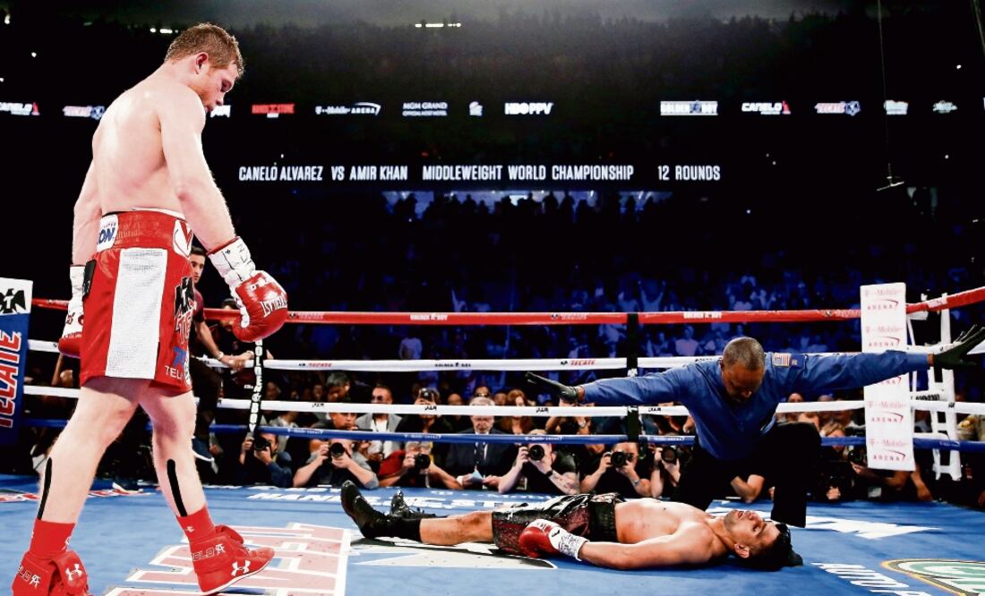 Con un volado de derecha, Saúl Álvarez noqueó a Amir Khan en el sexto (JOHN LOCHER. AP)