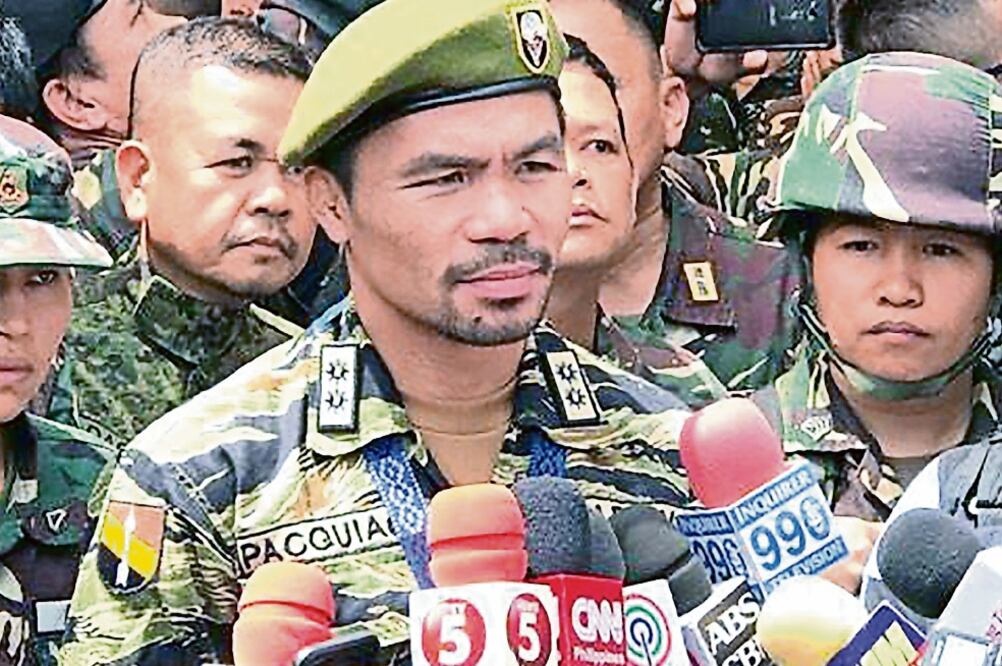 El pugilista prometió unirse a la lucha si la guerra continúa. (AFP)