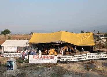 Suman 68 cuerpos exhumados de fosa en Tetelcingo