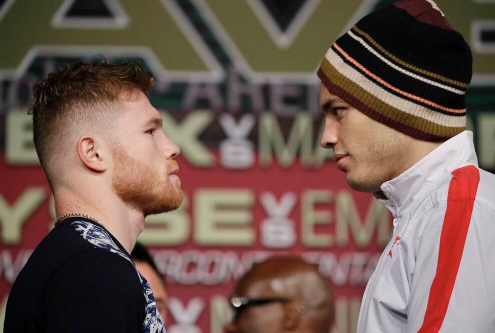 Saúl "Canelo" Álvarez y Julio César Chávez Jr. Foto: AP
