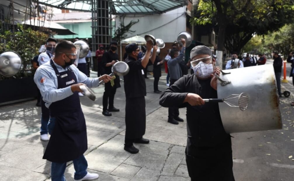 La batalla entre la economía y la salud, entre las fotos de la semana