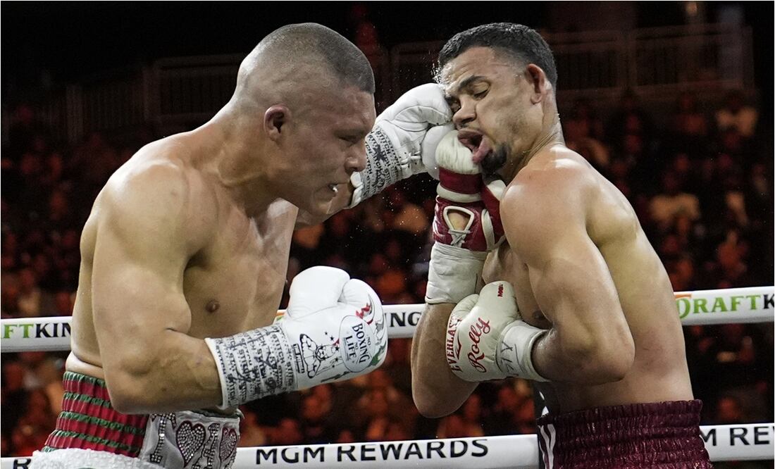 Pitbull Cruz en combate contra Rolly Romero. FOTO: AP