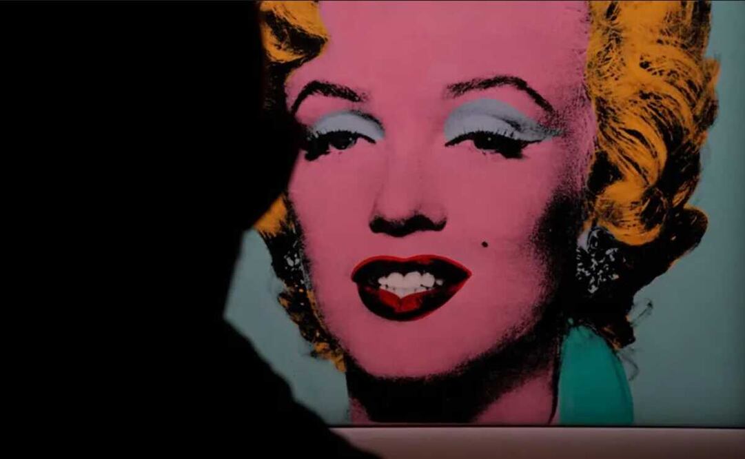 "Shot Sage Blue Marilyn" retrato de el artista Andy Warhol. Foto: AFP/ AFP Timothy A. Clary