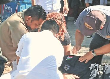 Chocan policías y ambulantes del Mercado Juan Sabines