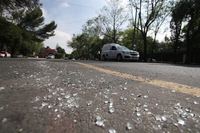 Vecinos de Lomas de Chapultepec hacen recuento de daños luego de ataque a García Harfuch