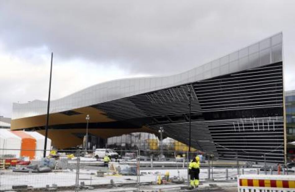 "Robots" devuelven libros en biblioteca del siglo XXI