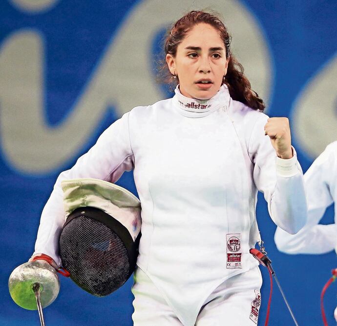 La mexicana acudió a su competencia y después a ver pelear a su novio (EDGARD GARRIDO. REUTERS)