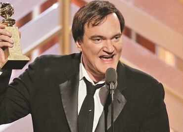 Quentin Tarantino y Rigo Tovar, en un día como hoy