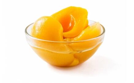 Profeco alerta por duraznos en almíbar no recomendables para niños